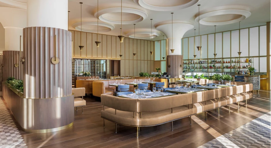Modern restaurant interior featuring stylish furniture, warm lighting, and luxurious ambiance