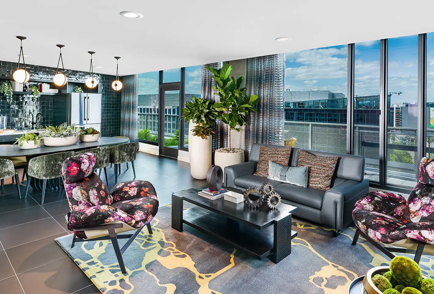 Stylish dining and entertainment space with striking black accents and large windows