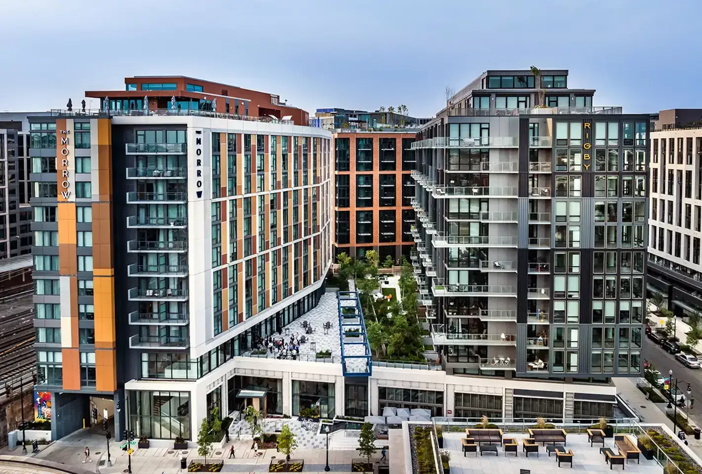 Urban lifestyle destination featuring modern building design and an open public space